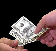 20080303002121-manosbilletes-n.jpg